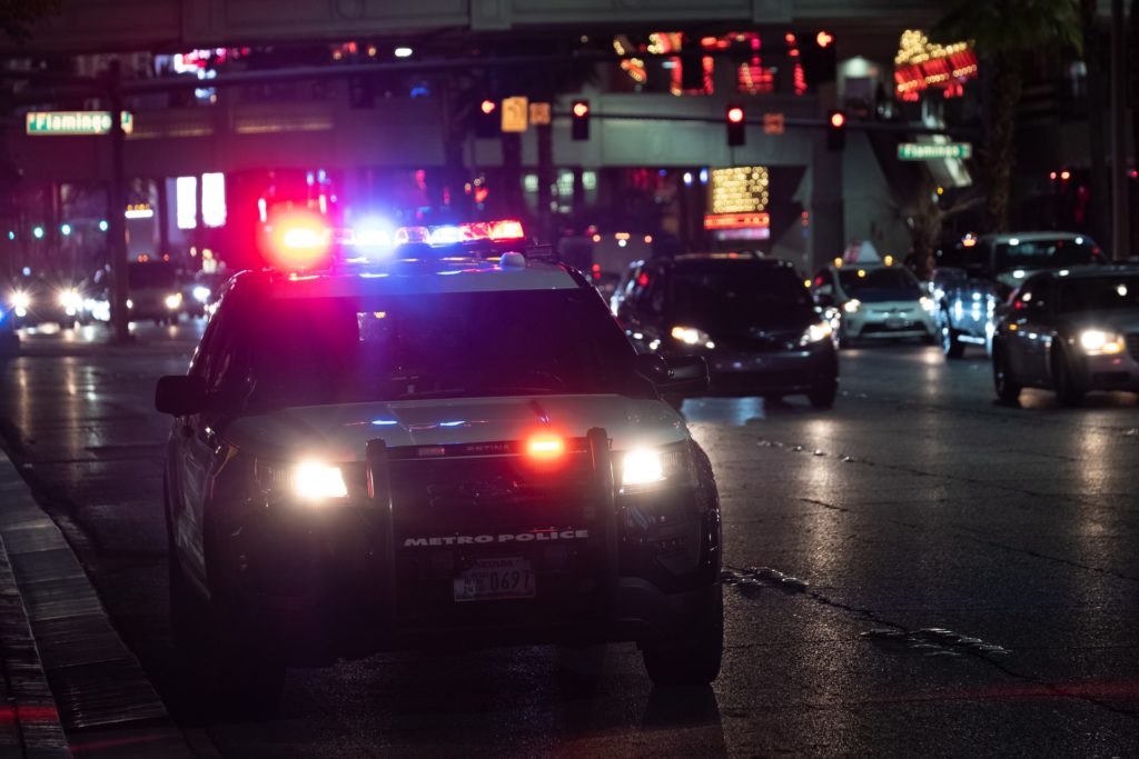 police car arrives at bar or nightclub shooting